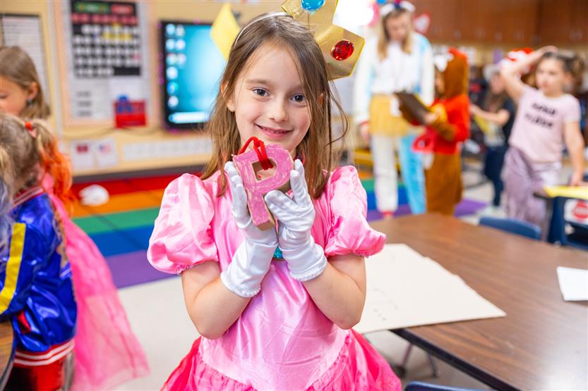 Students dress up in alphabet-themed costumes